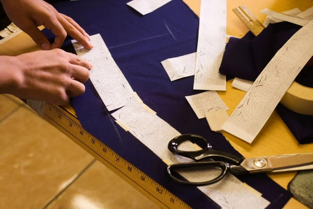 cut and sew apparel manufacturer fabric cutting table floor - Feaxe Sports